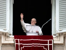 Pope Francis greets pilgrims from the window overlooking St. Peter's Square on July 25, 2021.